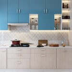 Modern kitchen with blue uppers and light wood lowers, ready to assemble kitchen cabinets, LED lighting and built-in oven