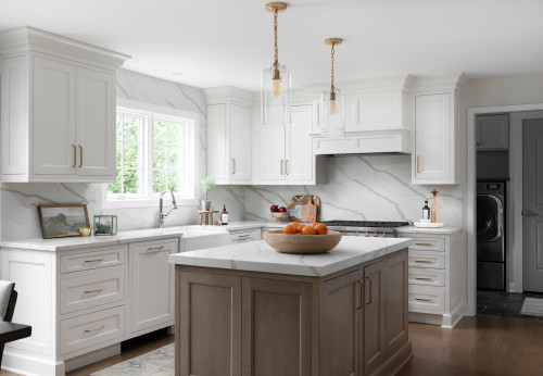 Modern kitchen by kitchen suppliers with white cabinets and wood island