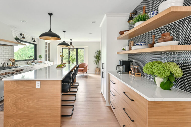 Modern RTA kitchen cabinets with wood finish, white countertops, and open floating shelves