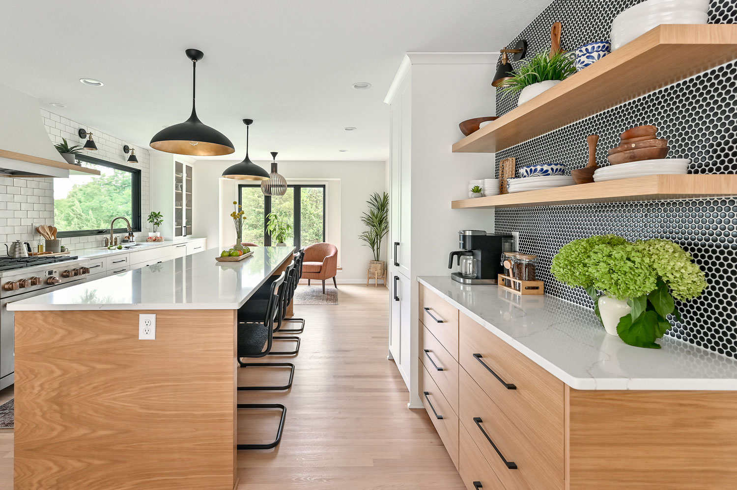 Modern RTA kitchen cabinets with wood finish, white countertops, and open floating shelves
