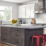 Kitchen suppliers offering in-stock white shaker cabinets with dark island