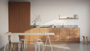 IKEA kitchen cabinets pros and cons shown in a minimalist kitchen with wood veneer cabinets and flat-panel design