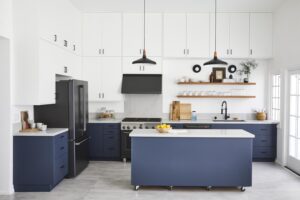 Two-tone IKEA-style kitchen showing how to choose IKEA kitchen cabinet colors with white upper cabinets and navy blue lower cabinets