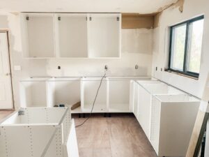 How hard is it to install IKEA kitchen cabinets during a DIY kitchen renovation with base and wall cabinet frames