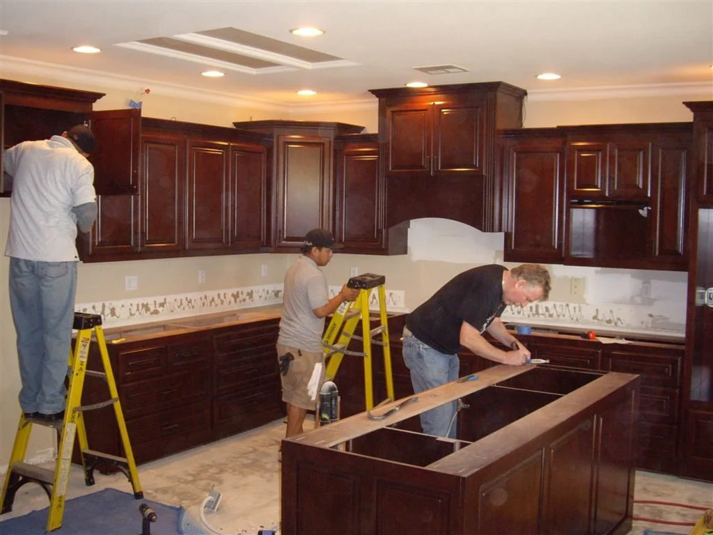 Finished kitchen cabinet installation showing properly aligned RTA cabinets and pantry cabinet planning